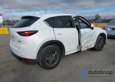 2021 Mazda Cx-5 Touring from USA, damaged, VIN JM3KFBCMXM0480109